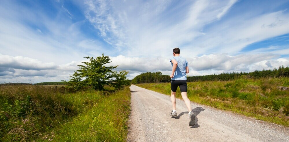 man running with Optimal Health